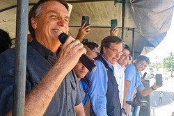 Jair Bolsonaro (PL) e Gilson Machado (PL) durante visita do ex-presidente ao Recife em 2022