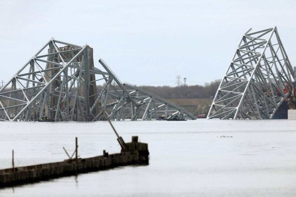 
A ponte Francis Scott Key depois de ser atingida por um navio de carga e desabar em 26 de maro de 2024 em Baltimore, Maryland  (foto: ROB CARR / GETTY IMAGES NORTH AMERICA / GETTY IMAGES VIA AFP)