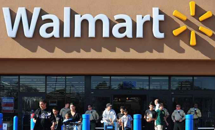 Walmart tem lucro de US$ 453 milhões no 3º tri, mas projeta, walmart mais  próximo 